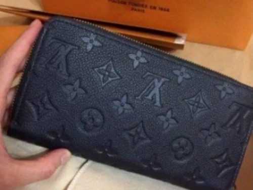 Click to view full screen Louis Vuitton Portefeuille Zippy M61864 photo review